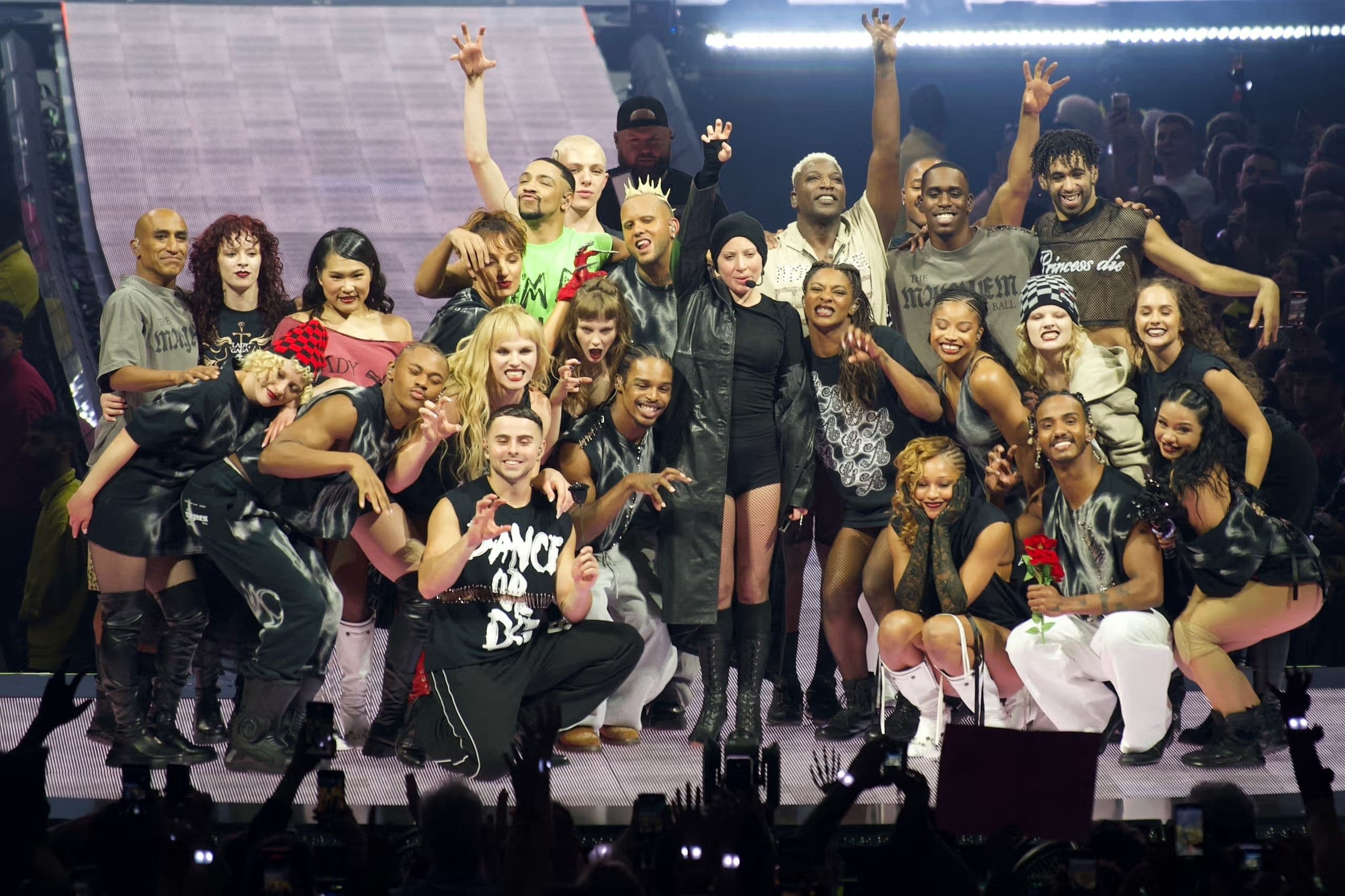 Lady Gaga and her dancers wearing the tour merch